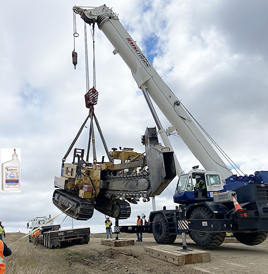 Trencher Lifting onto LowBoy